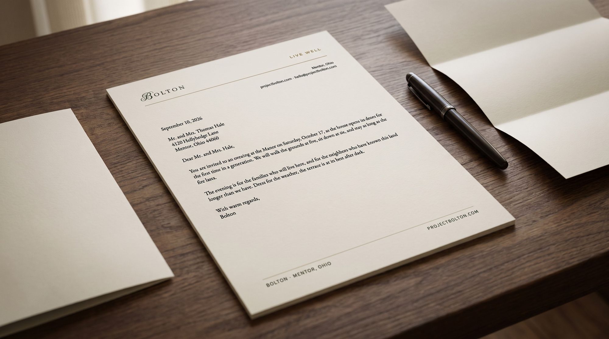 Bolton letterhead on a wooden desk