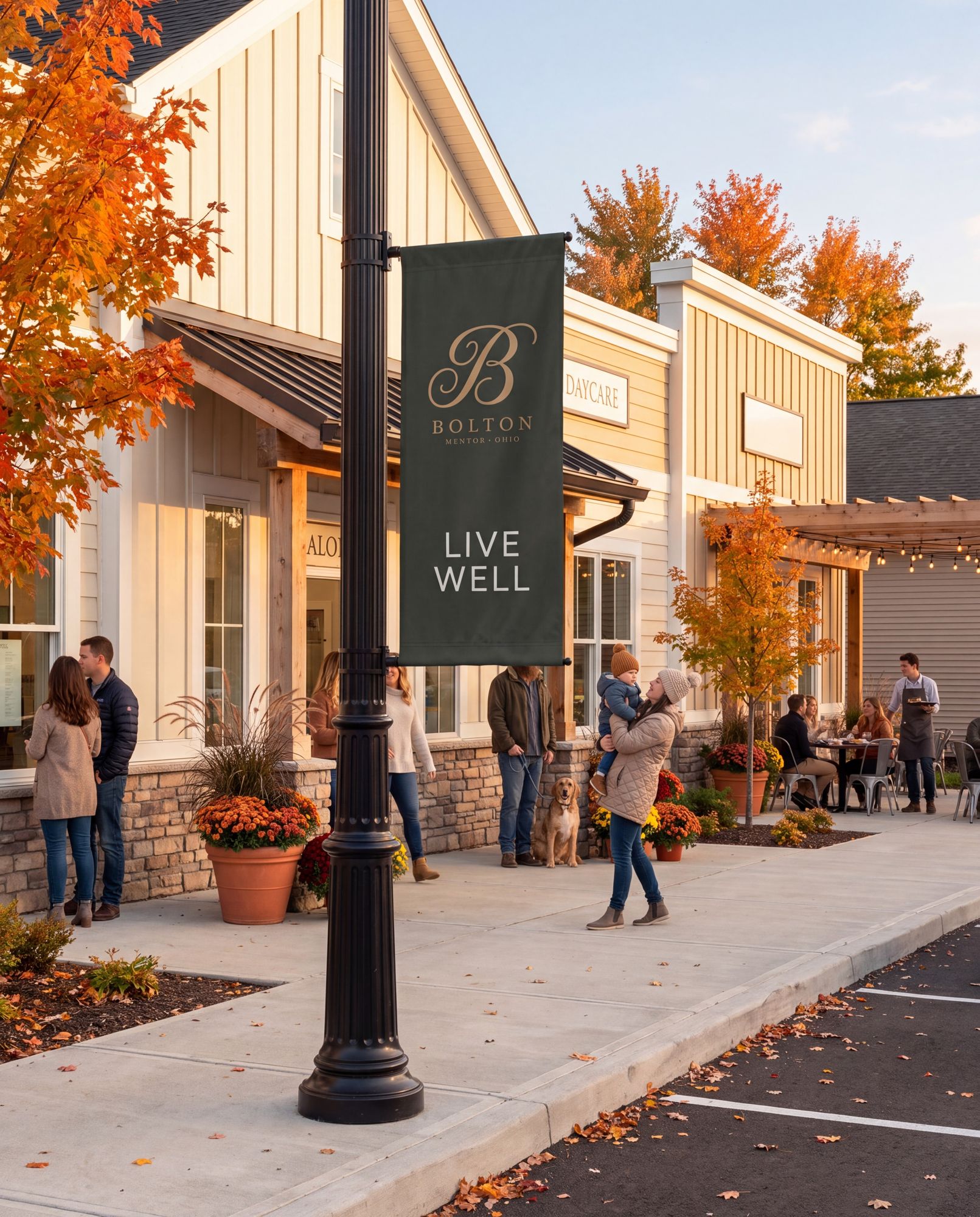 A Bolton Live Well banner on a lamppost outside the neighborhood shops
